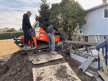 Travaux d’excavation résidentielle pour drainage et fondation par Drain Supra