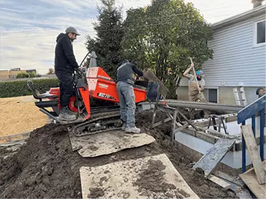 Travaux d’excavation résidentielle pour drainage et fondation par Drain Supra